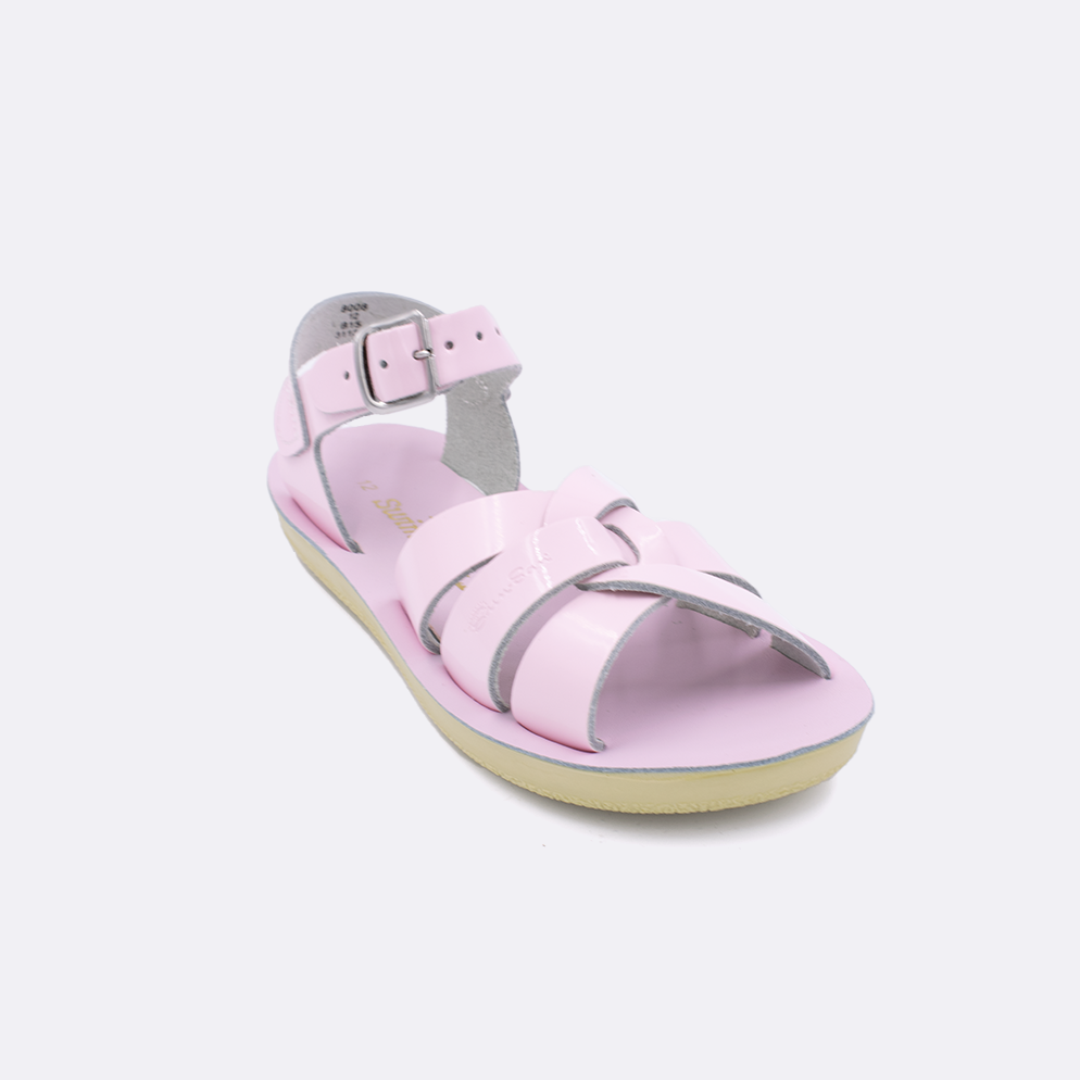 One little kid sized 8000 Swimmer style sandal with shiny pink straps and a shiny pink insole. Facing left to right diagonally. 