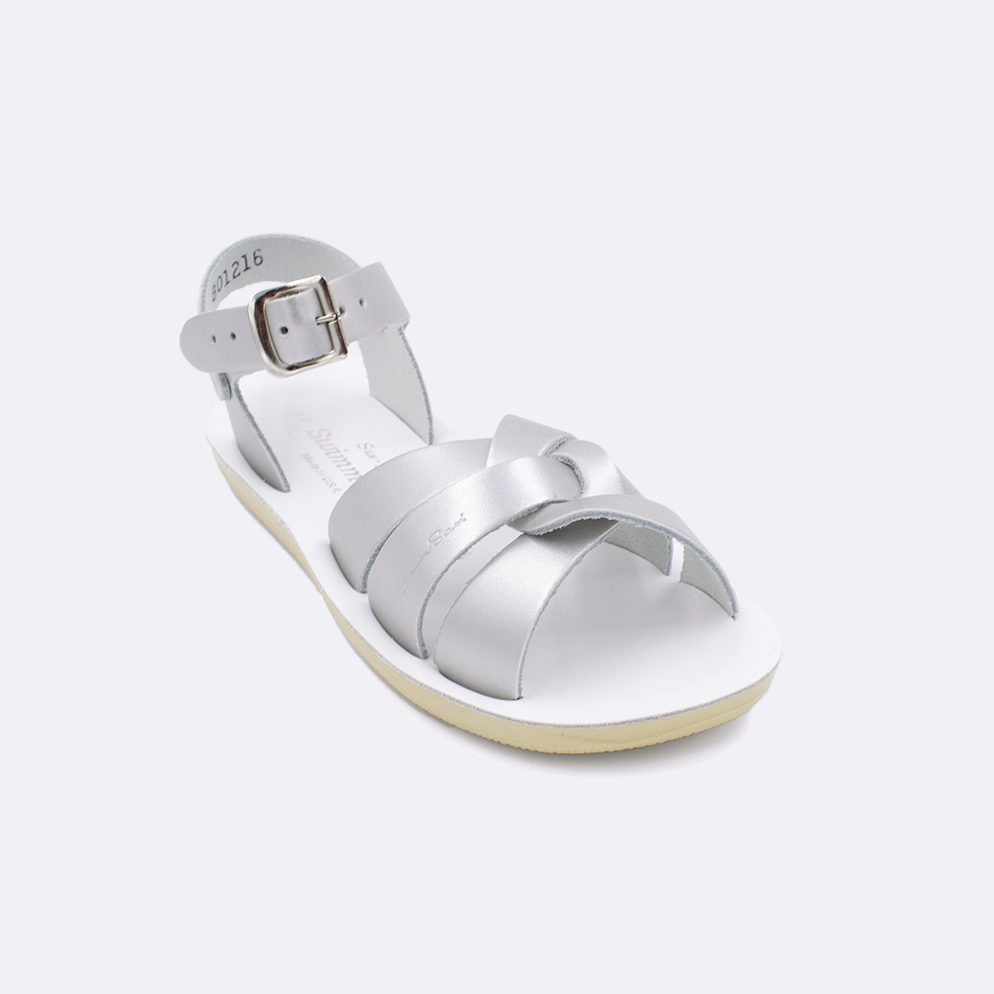 One little kid sized 8000 Swimmer style sandal with silver straps and a white insole. Facing left to right diagonally. 