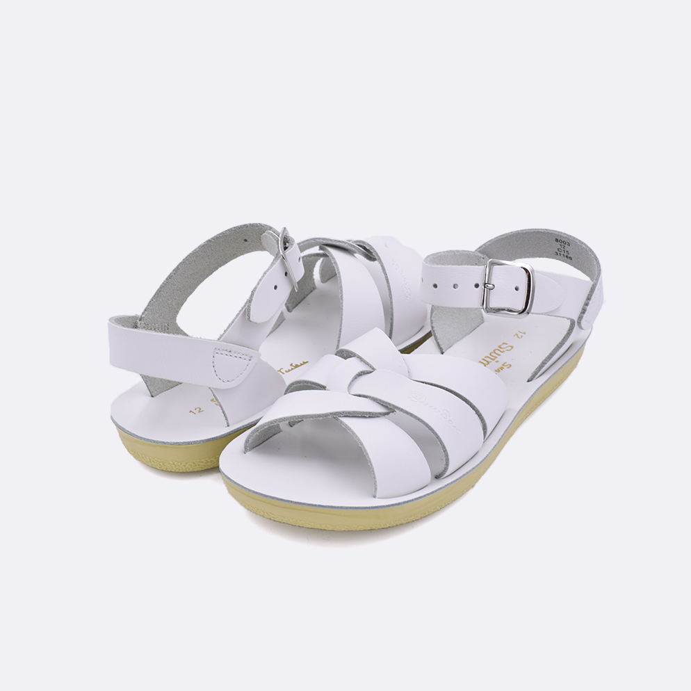 Two little kid sized 8000 Swimmer style sandals with white straps and white insoles. Both pushed together facing the camera diagonally.