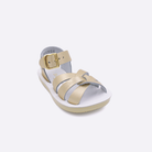 One toddler sized 8000 Swimmer style sandal with gold straps and a white insole. Facing left to right diagonally. 