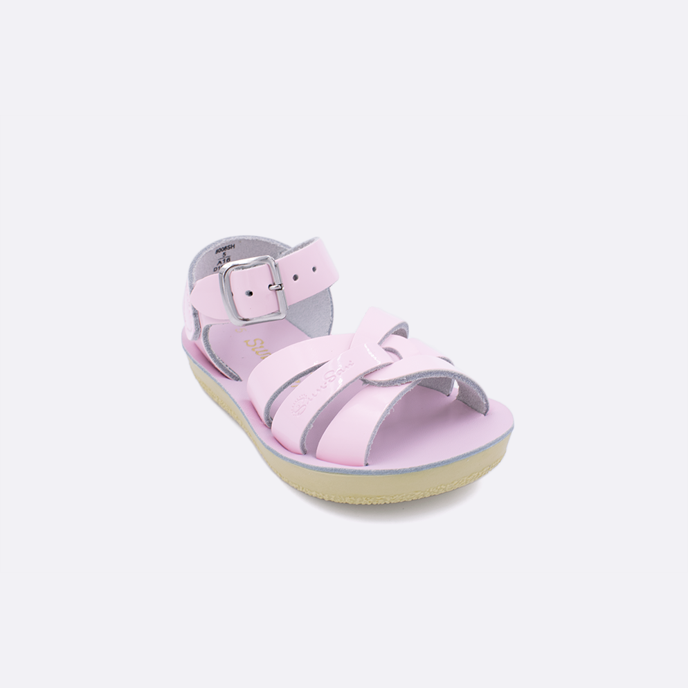 One toddler sized 8000 Swimmer style sandal with shiny pink straps and a shiny pink insole. Facing left to right diagonally. 