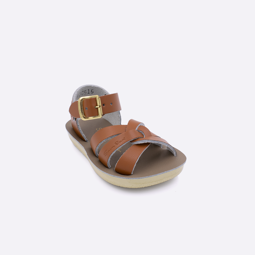 One toddler sized 8000 Swimmer style sandal with tan straps and a beige insole. Facing left to right diagonally. 
