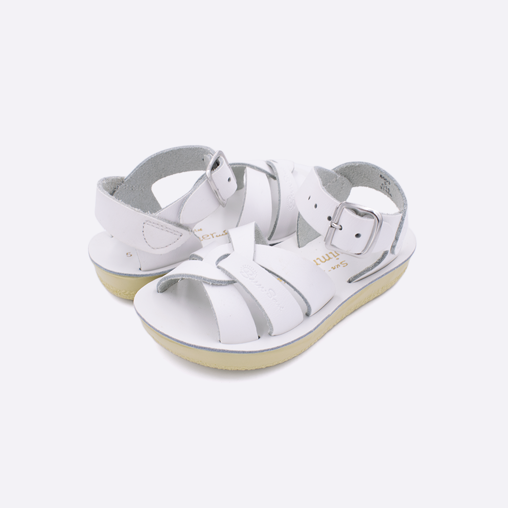 Two toddler sized 8000 Swimmer style sandals with white straps and white insoles. Both pushed together facing the camera diagonally.