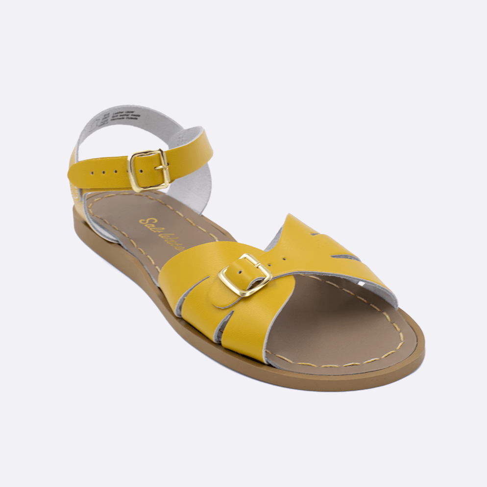 One 900 Classic style sandal color mustard. Facing left to right diagonally. 	Adult Size.