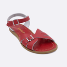 One 900 Classic style sandal color red. Facing left to right diagonally. 	Adult Size.	