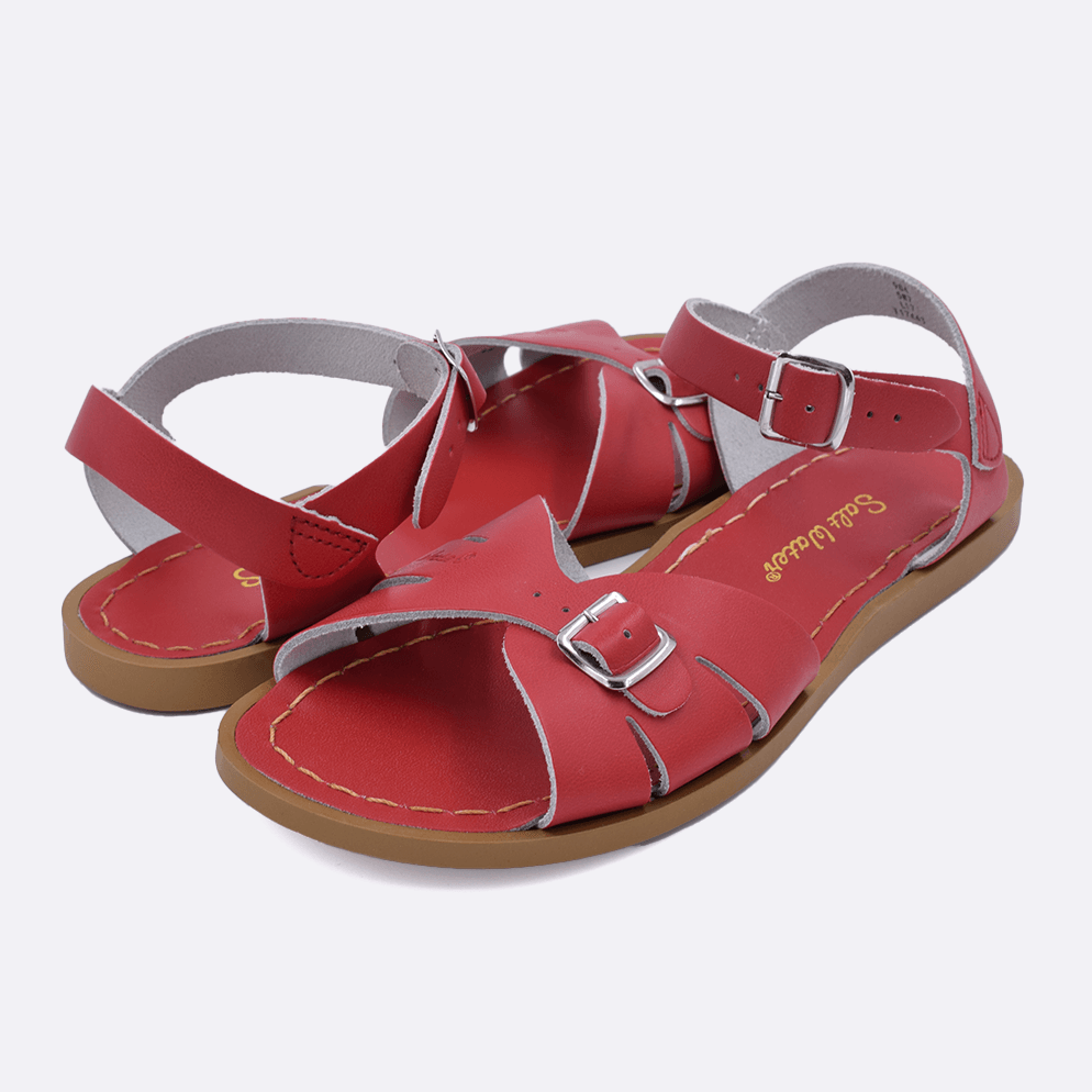 Two 900 Classic style sandal color red. Both pushed together facing the camera diagonally.	Adult Size.