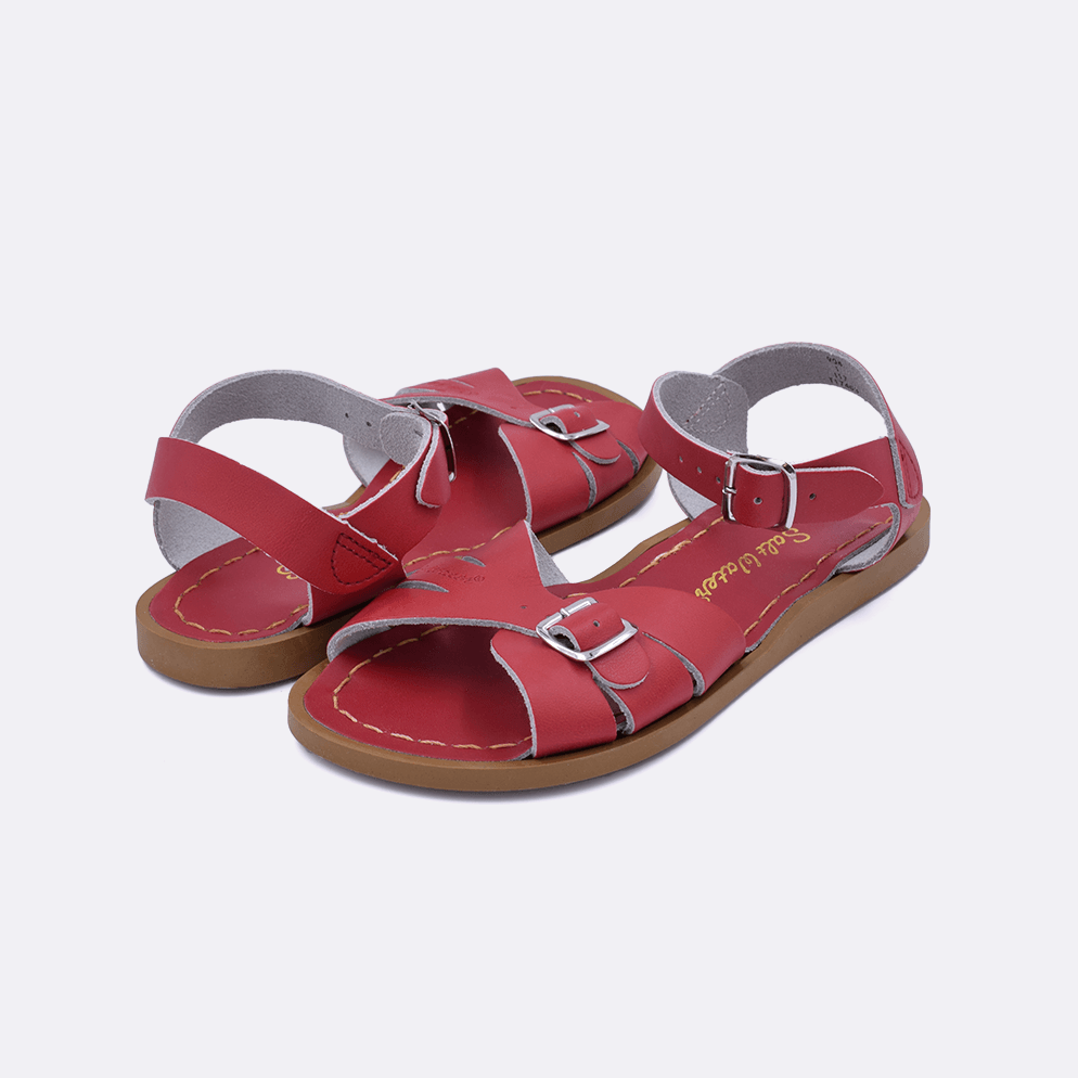 Two 900 Classic style sandal color red. Both pushed together facing the camera diagonally.	Little Kid Size.