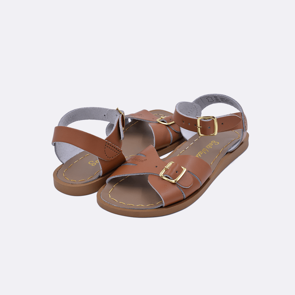 Two 900 Classic style sandal color tan. Both pushed together facing the camera diagonally.	Little Kid Size.