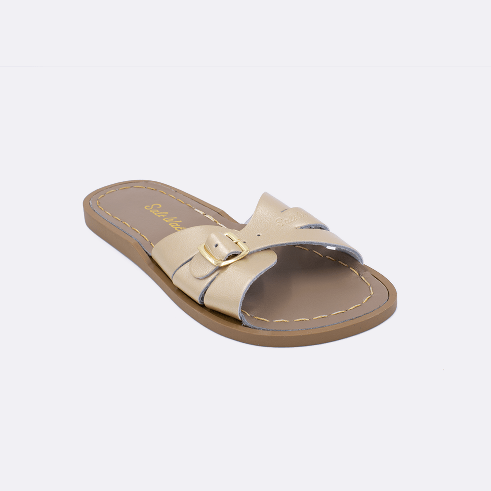 One 9900 Classic Slide style sandal color gold. Facing left to right diagonally. 	Little Kid Size.