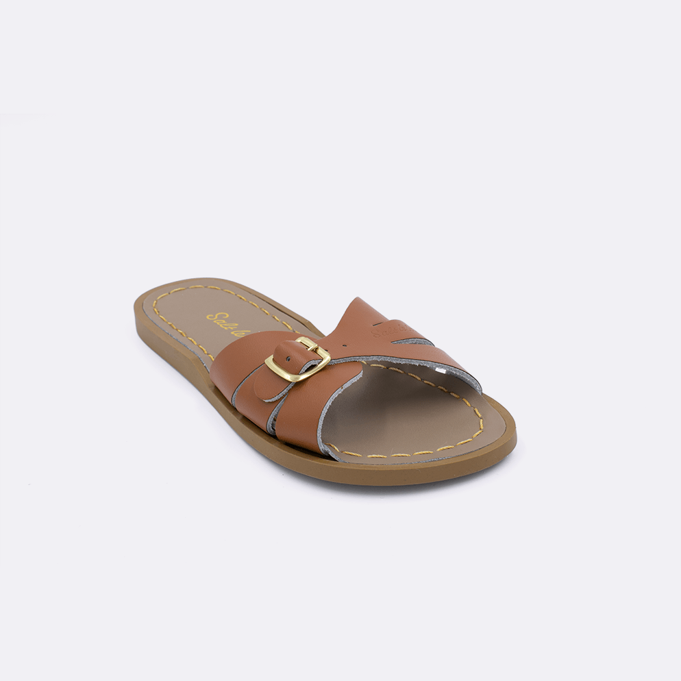 One 9900 Classic Slide style sandal color tan. Facing left to right diagonally. 	Little Kid Size.