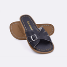 Two 9900 Classic Slide style sandals color black.  One standing with the sole facing the camera. The second is laying diagonally over the top left edge of the sole.	Little Kid Size.