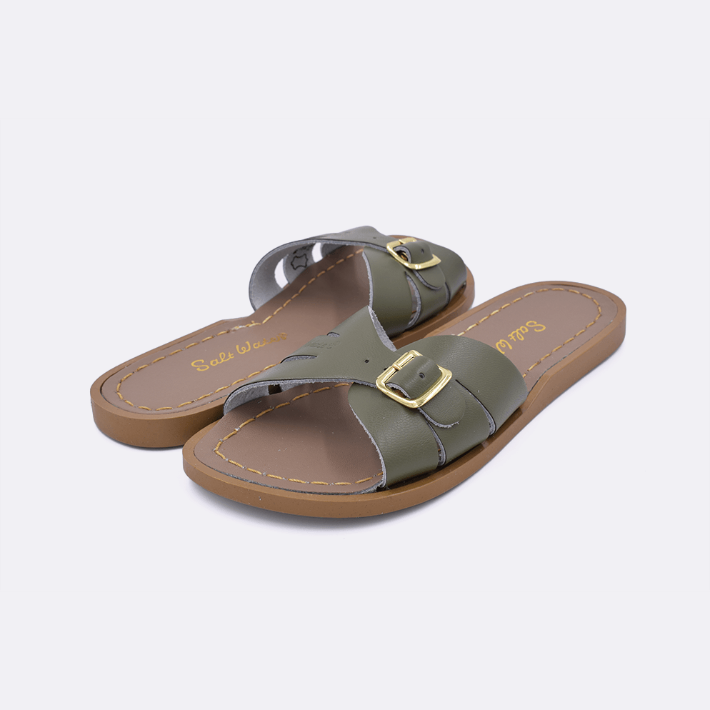 Two 9900 Classic Slide style sandal color olive. Both pushed together facing the camera diagonally.	Little Kid Size.