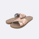 Two 9900 Classic Slide style sandal color rose gold. Both pushed together facing the camera diagonally.	Little Kid Size.