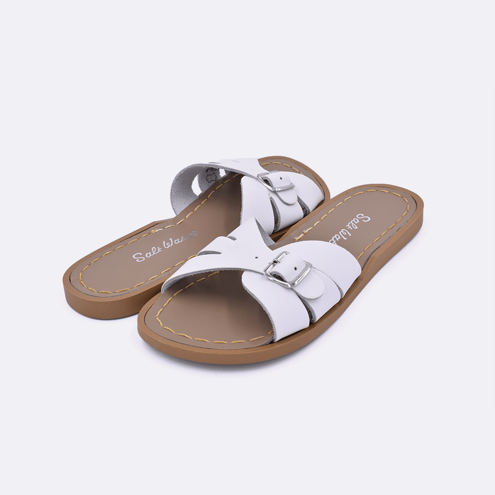 Two 9900 Classic Slide style sandal color white. Both pushed together facing the camera diagonally.	Little Kid Size.