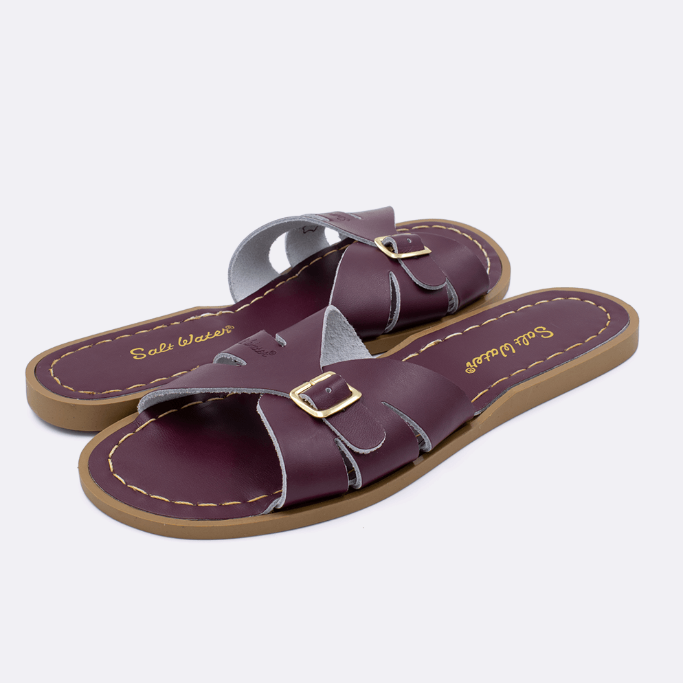 Two 9900 Classic Slide style sandal color claret. Both pushed together facing the camera diagonally.	Adult Size.