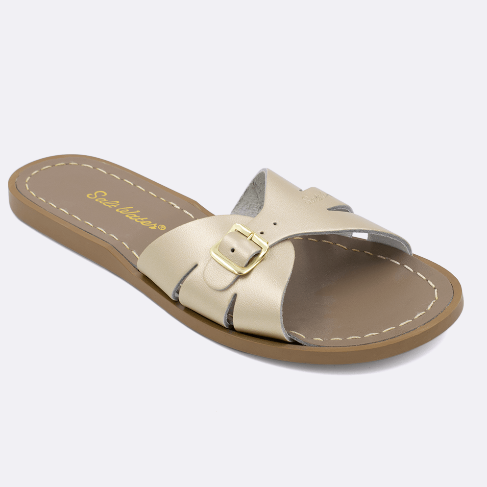 One 9900 Classic Slide style sandal color gold. Facing left to right diagonally. 	Adult Size.