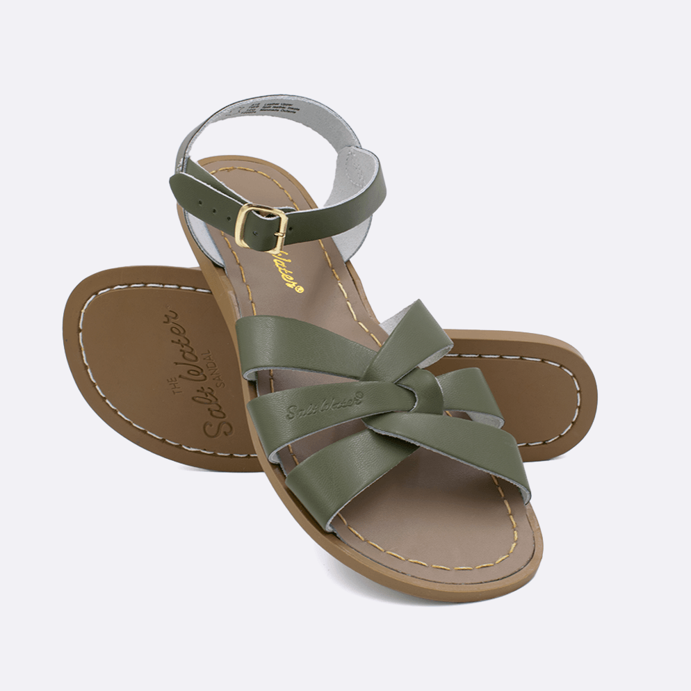 Two 800 Original style sandals color olive.  One standing with the sole facing the camera. The second is laying diagonally over the top left edge of the sole.	Adult Size.