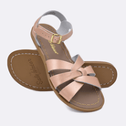 Two 800 Original style sandals color rose gold.  One standing with the sole facing the camera. The second is laying diagonally over the top left edge of the sole.	Adult Size.